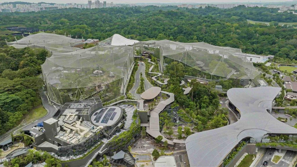 Panoramic view of Bird Paradise singapore with wide walk-through aviaries and trail