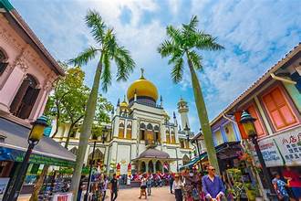 A row of family-friendly eateries on Bussorah Street near Sultan Mosque and Arab Street Singapore