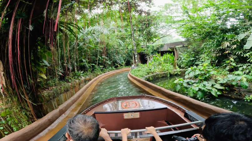 Amazon River Quest boat passing along animal habitats at River Wonders singapore