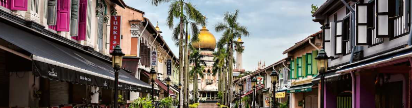 Sultan Mosque with a golden dome overlooking a pedestrian street in Kampong Glam Arab Street Singapore